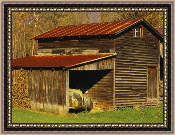 Raymond Gehman Vintage Automobile Is Parked in a Barn Framed Painting