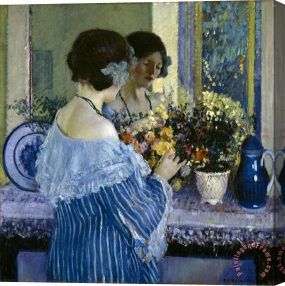 Frederick Carl Frieseke Girl in Blue Arranging Flowers Stretched Canvas Painting / Canvas Art