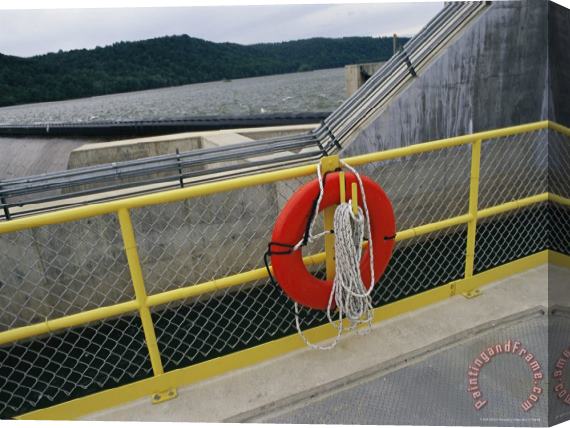 Raymond Gehman A Life Preserver Hangs on a Fence at The Holtwood Hydroelectric Dam Stretched Canvas Print / Canvas Art