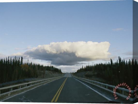 Raymond Gehman A Thundercloud Forms Above The Makenzie Highway Stretched Canvas Print / Canvas Art