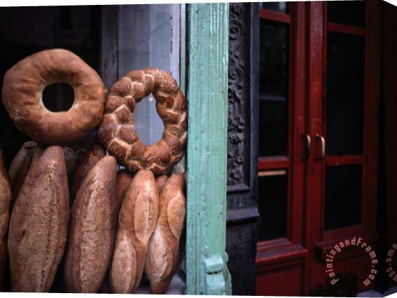 Raymond Gehman Bread Is Displayed in a Store Window Stretched Canvas Painting / Canvas Art