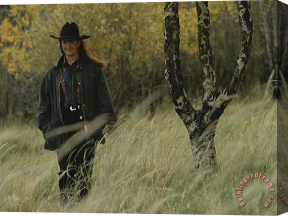 Raymond Gehman Cowgirl in The Grass Stretched Canvas Print / Canvas Art