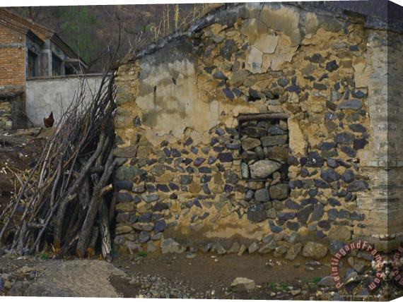 Raymond Gehman Firewood Stacked Against a Village Farmhouse Near Beijing Stretched Canvas Print / Canvas Art
