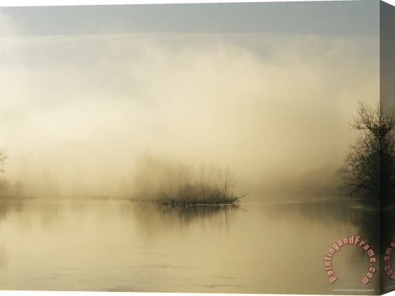 Raymond Gehman Fog Surrounds a Small Island in The James River at Dawn Stretched Canvas Print / Canvas Art