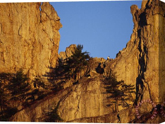 Raymond Gehman Hiker Near The Top of a 900 Foot High Seneca Rocks Stretched Canvas Painting / Canvas Art