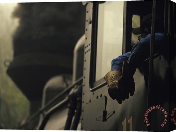 Raymond Gehman Railroad Engineer Looking Out of The Window From The Engine Car Stretched Canvas Print / Canvas Art