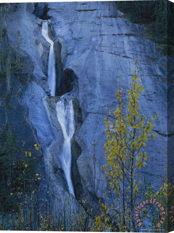 Raymond Gehman Scenic View of a Waterfall Streaming Over a Cliff Face Stretched Canvas Print / Canvas Art