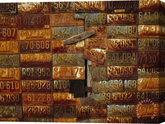 Raymond Gehman Side of a Building Adorned with Old License Plates Stretched Canvas Painting / Canvas Art