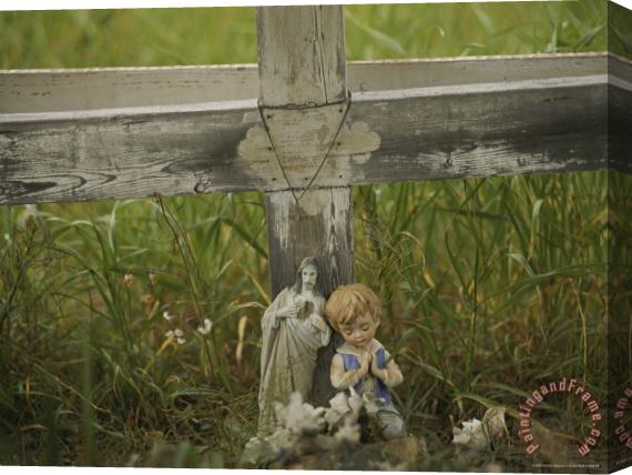 Raymond Gehman Small Statue And a Cross Draped with a Necklace Mark a Wayside Shrine Stretched Canvas Print / Canvas Art
