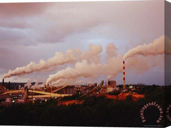 Raymond Gehman Steam And Smoke Billow Out of Chimneys at an Industrial Plant Stretched Canvas Painting / Canvas Art