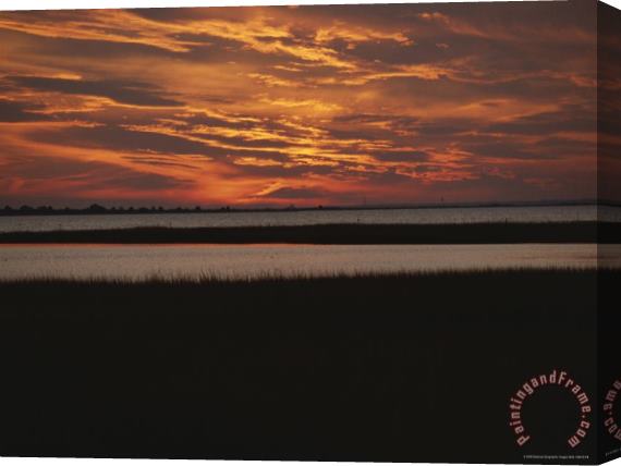 Raymond Gehman Sunset Over a Salt Marsh with Cordgrass Stretched Canvas Painting / Canvas Art