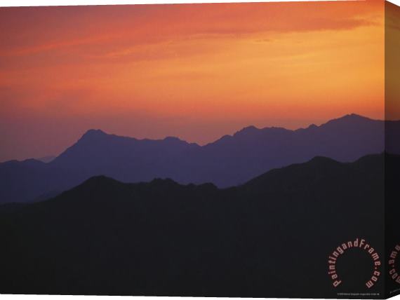 Raymond Gehman Sunset Silhouettes The Mountains Near The Mutinanyu Section of The Great Wall Stretched Canvas Print / Canvas Art