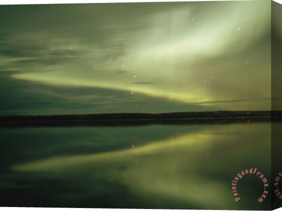 Raymond Gehman The Aurora Borealis Is Reflected Brightly in The Mackenzie River Stretched Canvas Painting / Canvas Art